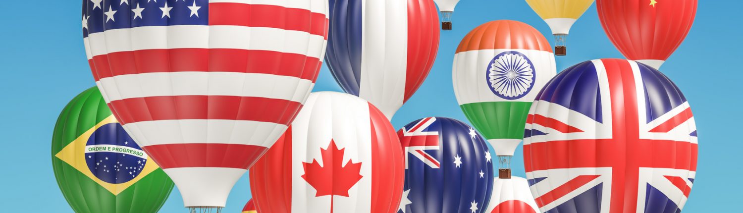 Travel concept. Hot air balloons with different flags of countries, 3D rendering